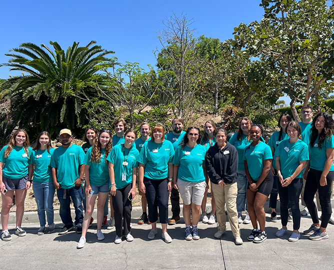 a group of students stand for a photo