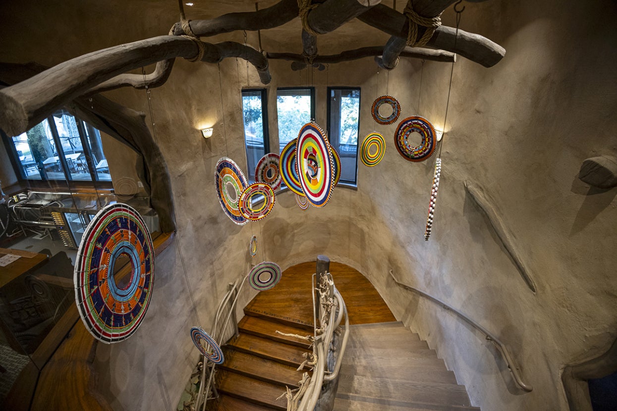 Mkutano House staircase with chandelier